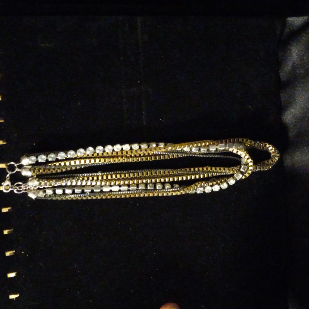 7 layers of necklace. Truly a statement piece!
